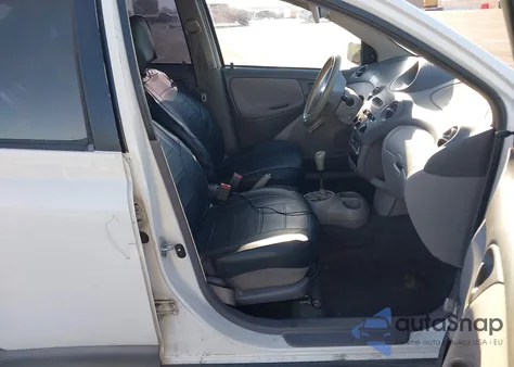 2000 Toyota Echo из США, поврежденный, VIN JTDBT1230Y0083745